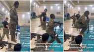 "It's not that hard": Nigerian lady in US Army shares video of pool training with guns, wows many