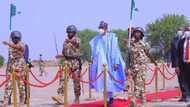 Thousands line up the road to welcome President Buhari to Borno