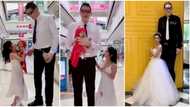 "Long distance relationship": Lady and her very tall bae walks side by side on the street, video stuns people