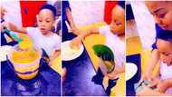 Celebrity stylist Toyin Lawani teaches son how to make moin-moin in new video