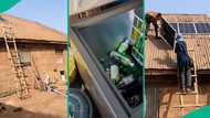 Nigerian woman selling cold drinks installs solar panels on her old roof to power her chest freezer