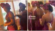 Women supporting women: Video of asoebi ladies helping each other lace up their corsets