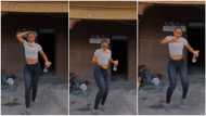"Fine Yoruba girl": Young lady dances in front of her house without minding background, video stirs reaction