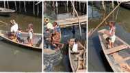 "She is very safe": Strong nursing mum carries her child on her back while paddling wooden boat in viral video