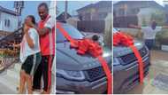 "Not even a kiss for him?" Video of man gifting brand new Range Rover to his woman sparks mixed reactions
