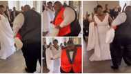 Chubby groom and his beautiful bride steal show at their wedding with amazing shoulder dance moves in video