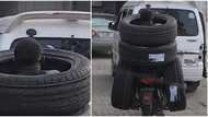 Wetin we no go see for Lagos? Nigerians react as man rides motorcyle carrying 4 tyres together