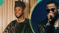 Kizz Daniel goes traditional, makes grand entrance with 'Oriki' singer, talking drum at OVO Arena