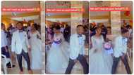 Nigerian man makes funny sigh of relief on wedding day as he walks with bride, people laugh