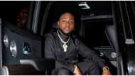 Davido 'presses necks' as he poses in plush interiors of his Rolls Royce, shades those asking him to calm down