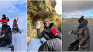 Billionaire vacation: Fun photos as Mr Eazi, Temi Otedola hit Iceland, go snowmobiling, dine in a cave