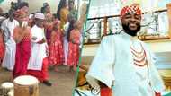 Boy imitates Davido's wedding outfit for his school's cultural day, wows Netizens: "He smashed it"