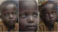 Ravishing cutie: Handsome little boy with glowing black skin and strange eyeballs stuns many, video goes viral