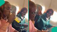 Video: Mum drinks anointing oil and applies it on her face as she enters airplane for first time