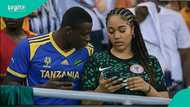 Tanzanian fan tries to woo Nigerian woman in stadium during AFCON game, netizens react