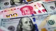 China's yuan hits 15-year low after Xi extends rule