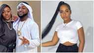 Pictures of Davido passionately kissing pretty model Mya Yafai surfaces online