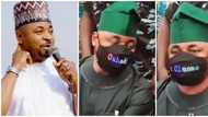 MC Oluomo stirs massive reaction online as he rocks electronic mask displaying his name