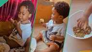 Video shows little boy moulding and pressing eba like adult, people react