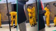 "See me see wahala": Video shows little boy 'fighting' his dad during photoshoot over his mum
