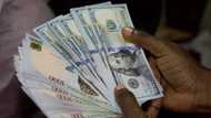 Naira strengthens against dollar, crashes against pound