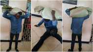 Watch video of how young thief surrendered to the police after stolen bag got stuck on his head (photos)