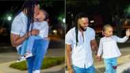 Nigerians react to viral photo of singer Flavour kissing his daughter, says it is wrong