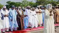 Eid-el-Fitr: Buhari celebrates with children, receives gigantic Sallah greetings card from minister (photos)