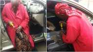 78-year-old female technician spotted fixing cars on the street