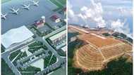 Workers build airport at 5,900ft above sea level on mountain top in China (photos)