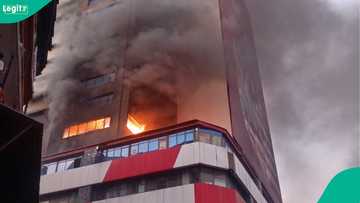 Woman cries as she loses 2 shops in 22-storey-building fire in Lagos, posts clip