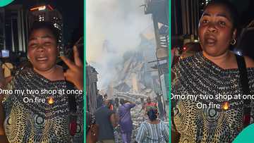 Great Nigeria Tower fire: Heartbroken businesswoman weeps as she loses 2 shops to flames, posts clip