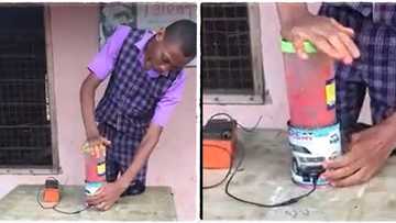 "He is in secondary school": Talented boy in uniform blends tomatoes with blending machine he built