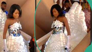 Woman makes wedding dress from plastic cups, spoons & plates, takes creativity to another level