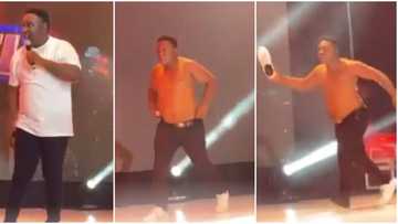 Comedian I Go Tuk goes wild, removes shirt, shoes on stage as E-money, others gift him over N5m at AY's show