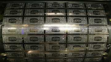 Asian markets fluctuate after Fed cuts interest rates