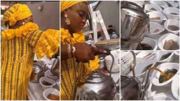 Video captures lady serving ewedu and gbegiri with kettles, Nigerians give mixed reactions