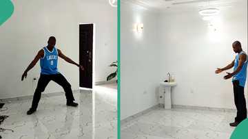Young man shows off his well-lit empty room, wonders how he would decorate it, his video trends