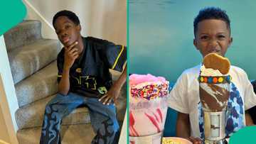 Wizkid’s 1st son Bolu gifts his brother Zion some pounds notes as he marks 7th birthday: “Ballers”