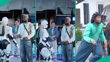 Brain Jotter buys female robot in China, video leaves Nigerians talking: "She set, see her backside"