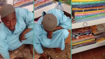 "Something is fishy": Nigerian man caught on camera digging hole inside shop, video trends online