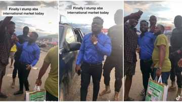 Man who looks like Comedian Sabinus storms Aba international market with security, people rush him in video