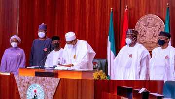 BREAKING: President Buhari signs 2021 budget into law (photos)