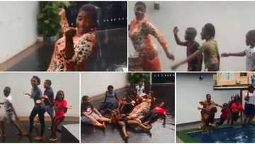 I am that aunty who breaks rules: Mercy Johnson plays with her kids, nieces in the rain in fun video