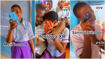 Secondary school students with iPhone 13 pro, X, and XR show them off in class, Nigerians react to their video