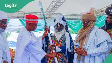 Kano Emirate tussle: Gov Yusuf presents staff of office to reinstated Emir, photos trend