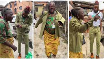 "This is my turn": Nigerian mother wears her son's NYSC khaki, dances with joy to welcome him from service