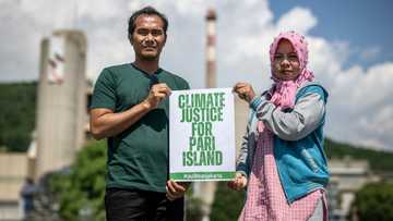 Indonesian islanders take on Swiss cement group in climate case