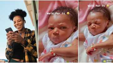Their grandma came back: Video shows Nigerian baby frown after opening eyes & looking around, wows many