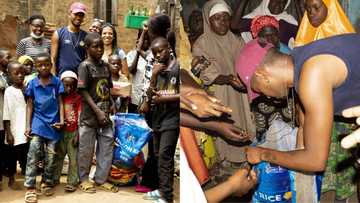 Big Brazilian footballer and his wife storm Nigerian streets, share food, other items to kids and parents